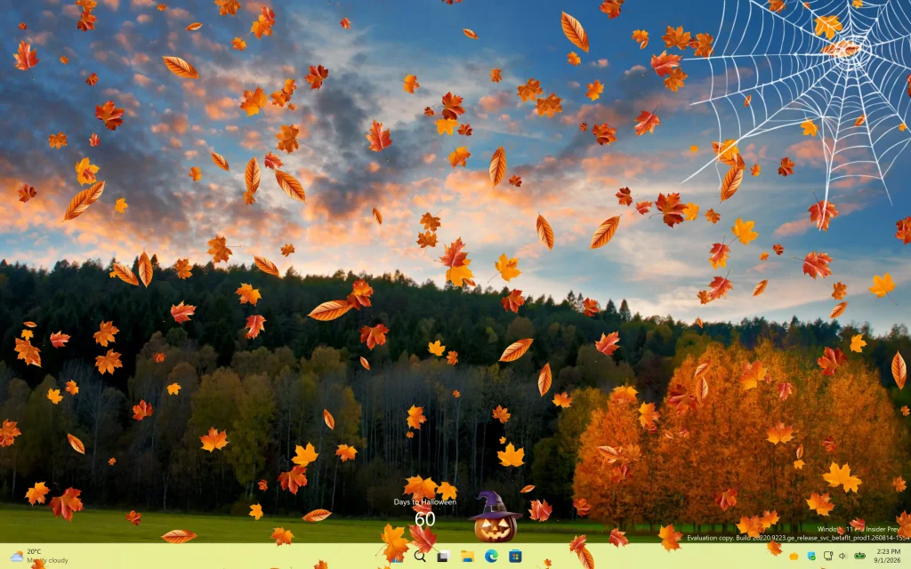 Windows 11 desktop with the falling leaves and spider web