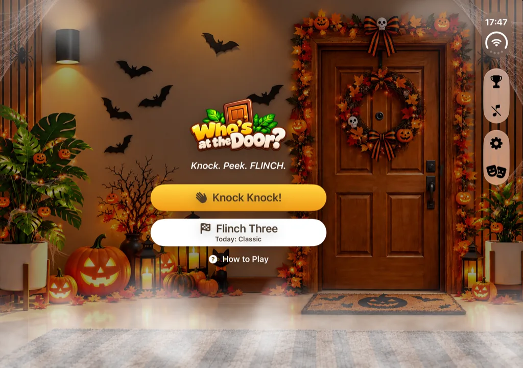 Halloween theme in Who's at the Door? with pumpkins, bats and a spooky wreath