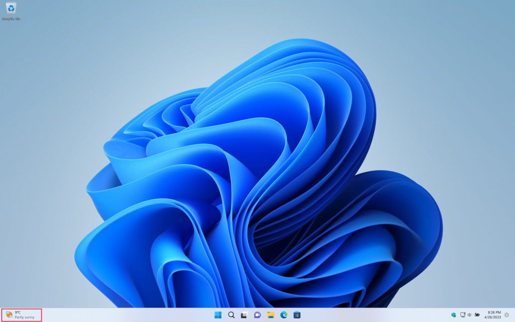 Windows 11 desktop with on the bottom left the weather icon